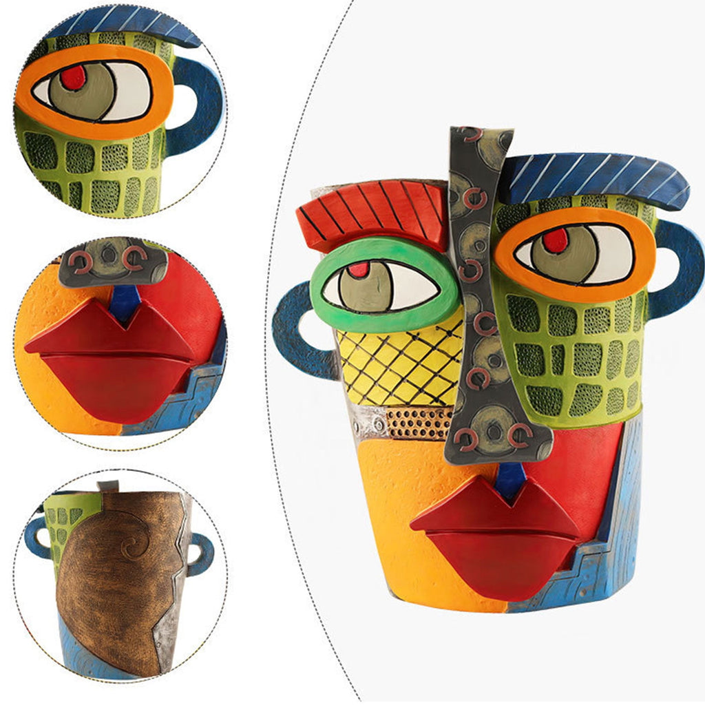 Colorful ceramic face sculpture with close-up details on a white background