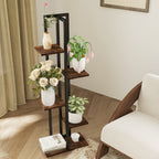 Decorative plant stand with plants and flowers in a living room setting