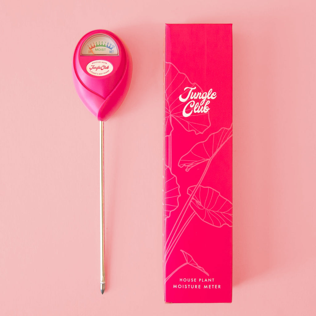 Pink moisture meter with 'Jungle Club' branding on a pink background