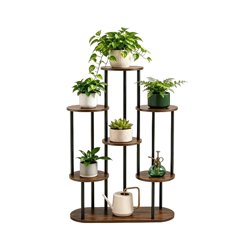 A 6-tier corner plant stand with dark brown wooden shelves and black metal legs, shown holding several potted green plants and decorative vessels on a light white background. 