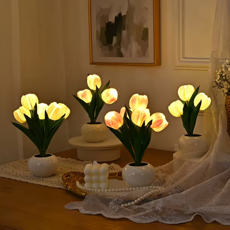Decorative lights shaped like tulips on a table with a soft background