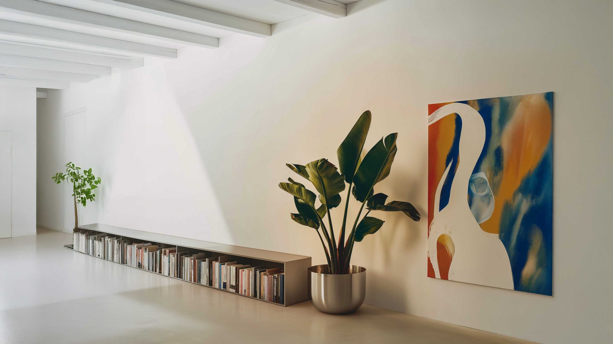 Modern interior with potted plants and a colorful abstract painting on a white wall.